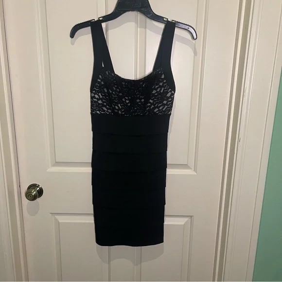 Sweet storm sleeveless, black with lace mini dress size Medium